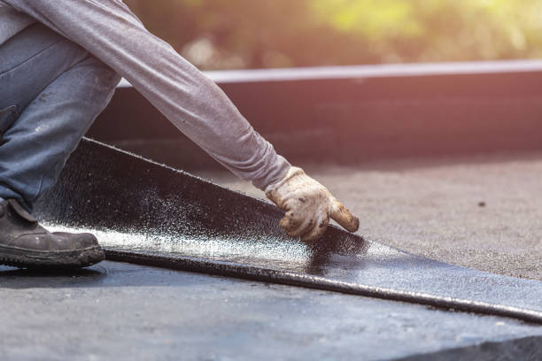 Professional Waterproofing technician working in Moline, IL